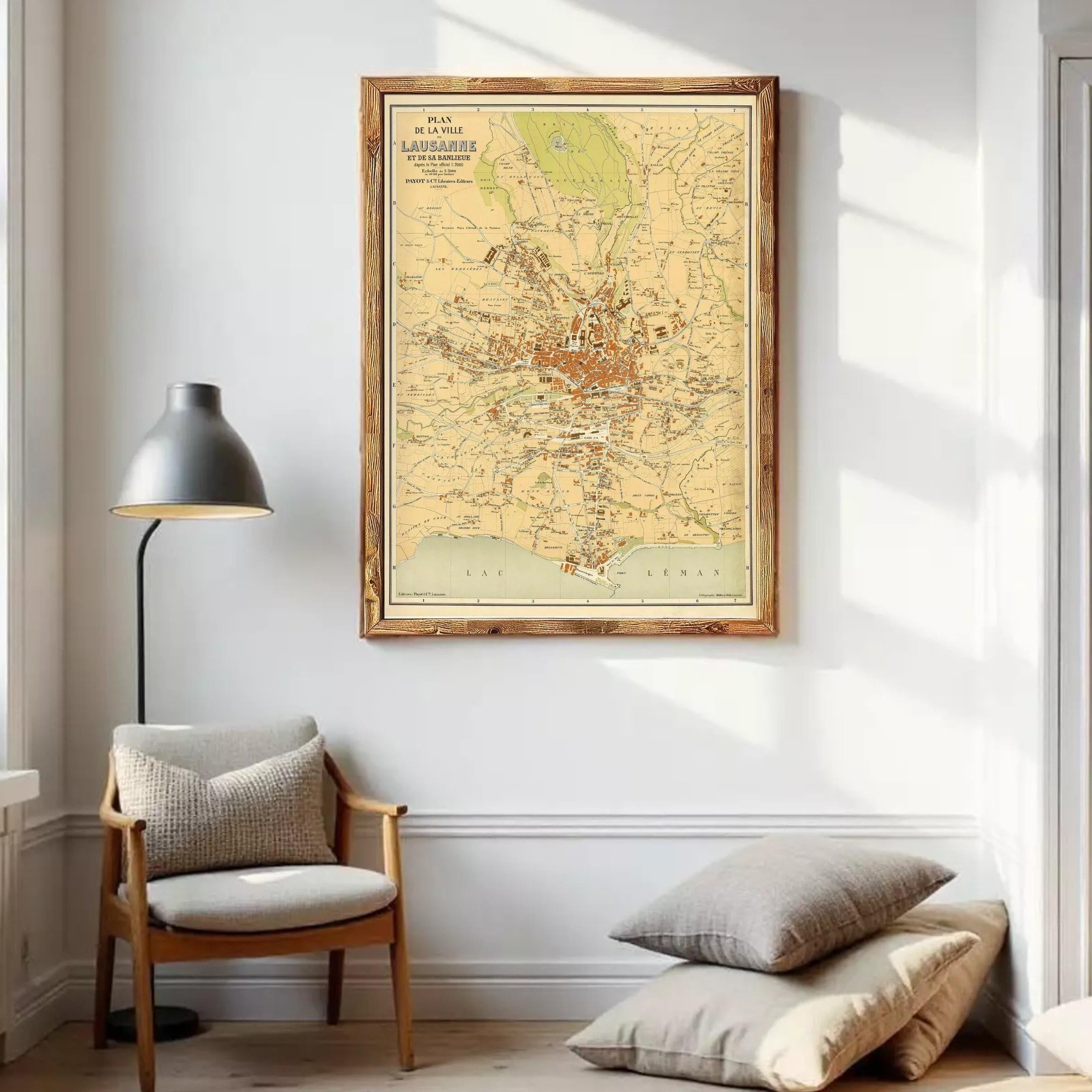 The image is a framed vintage map of the city of Lusanne, Switzerland, depicting the city's layout and surrounding areas.