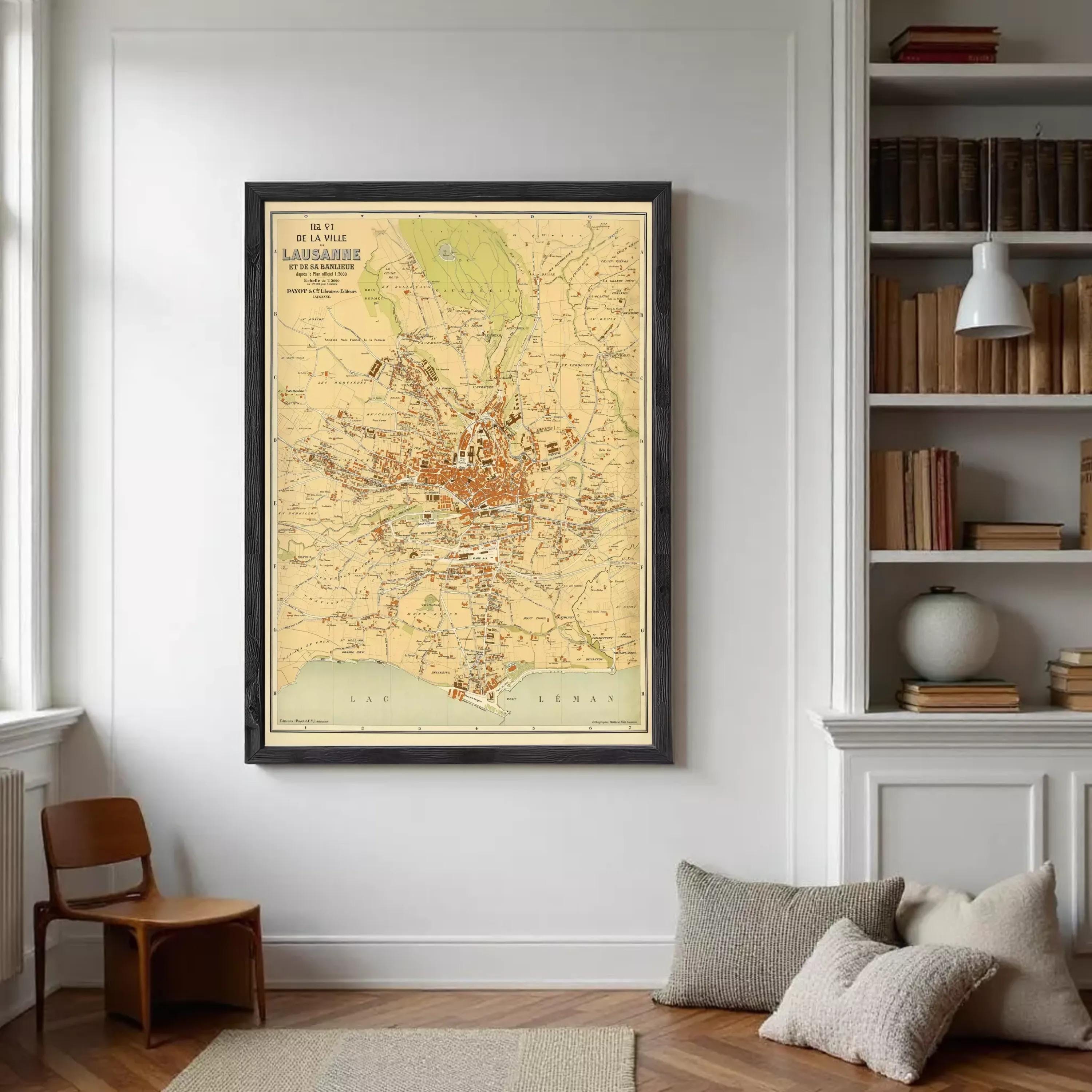 The image is a framed vintage map of the city of Lausanne, Switzerland, depicting the city's layout and surrounding areas.