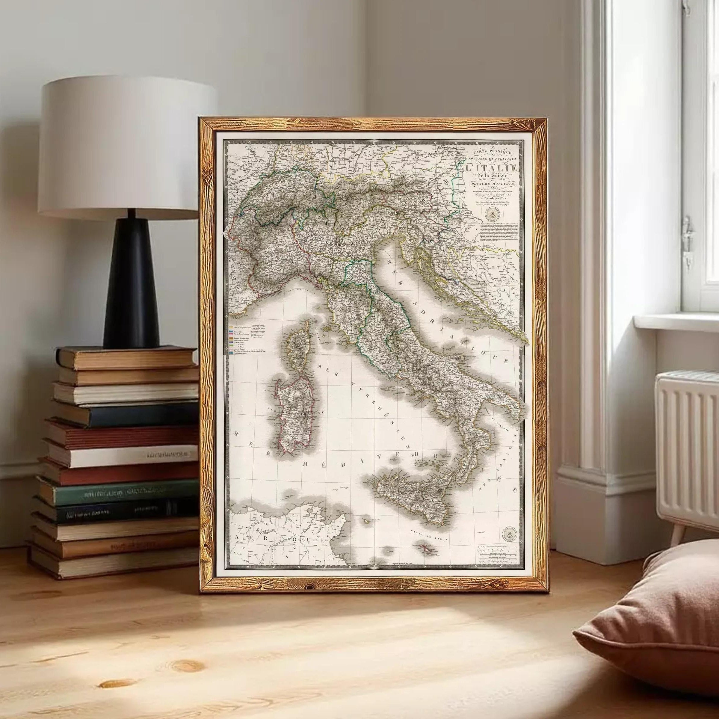 The image is a framed map of Italy, showing the country's geographical layout and surrounding areas.