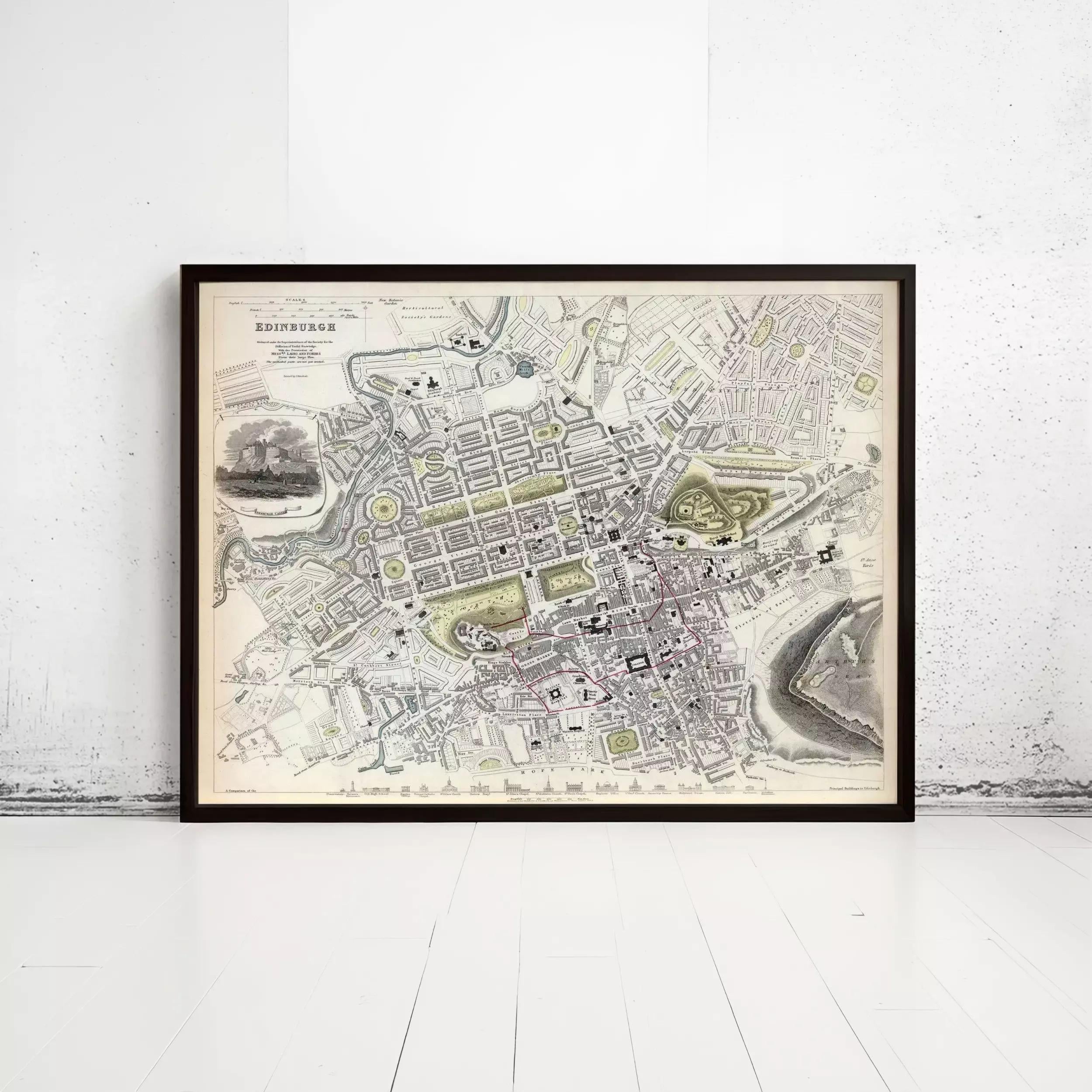 The image is a framed map of a city, likely London, with various landmarks and streets depicted.