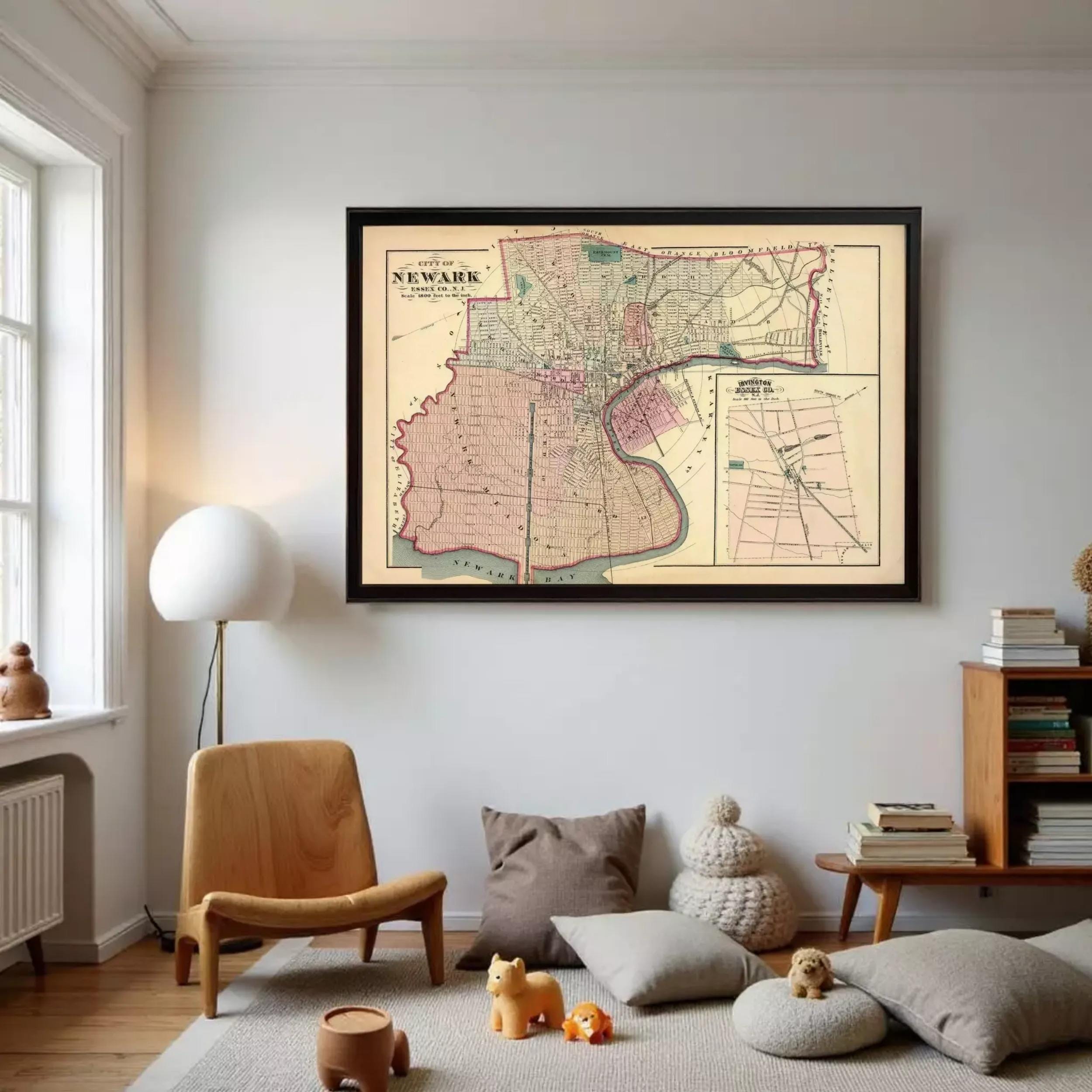 a large framed map of New York City hanging on a wall in a cozy living room setting.