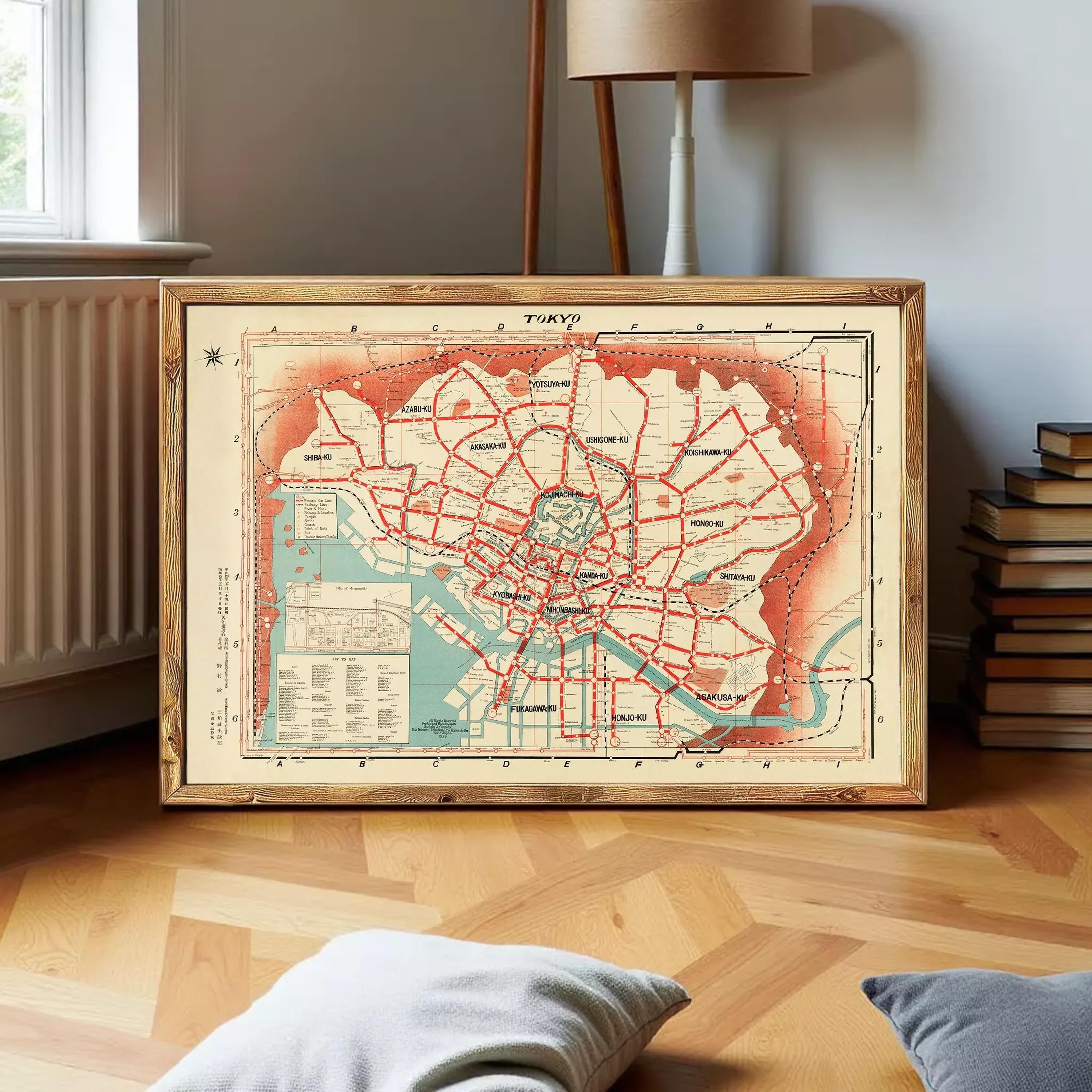 The image is a framed vintage map of Tokyo, Japan, depicting the city's streets and transportation system.