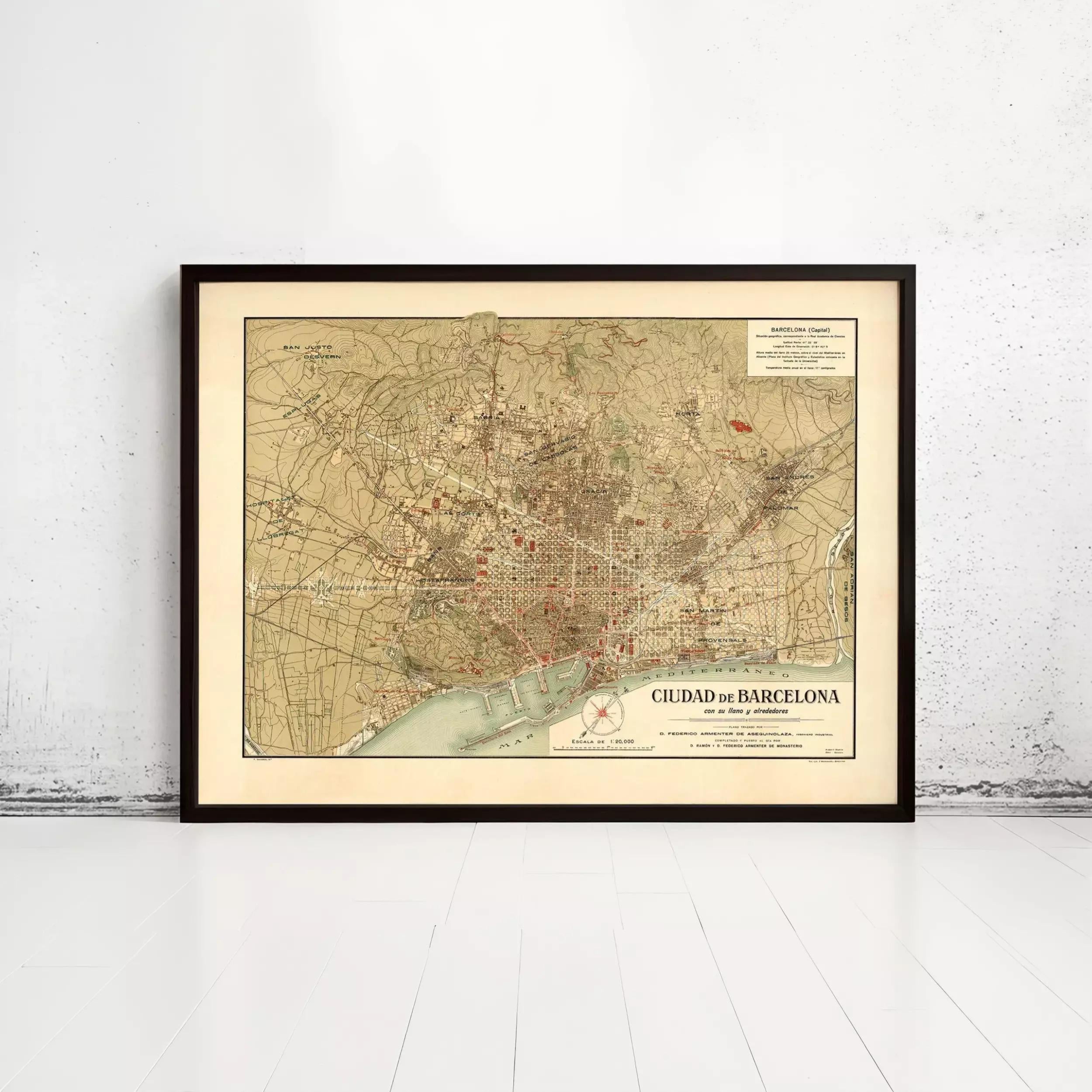 The image is a framed vintage map of Barcelona, Spain, depicting the city's streets and landmarks.