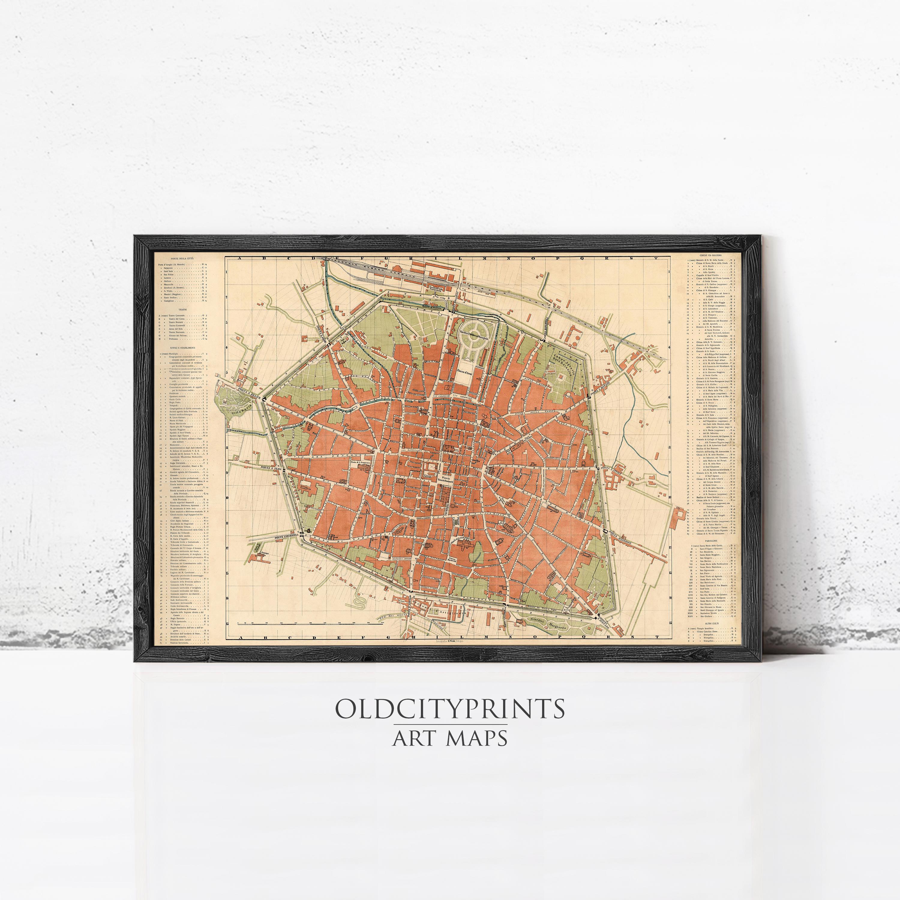 The image is a framed vintage map of a city, likely from the 19th century, with detailed street and building maps.