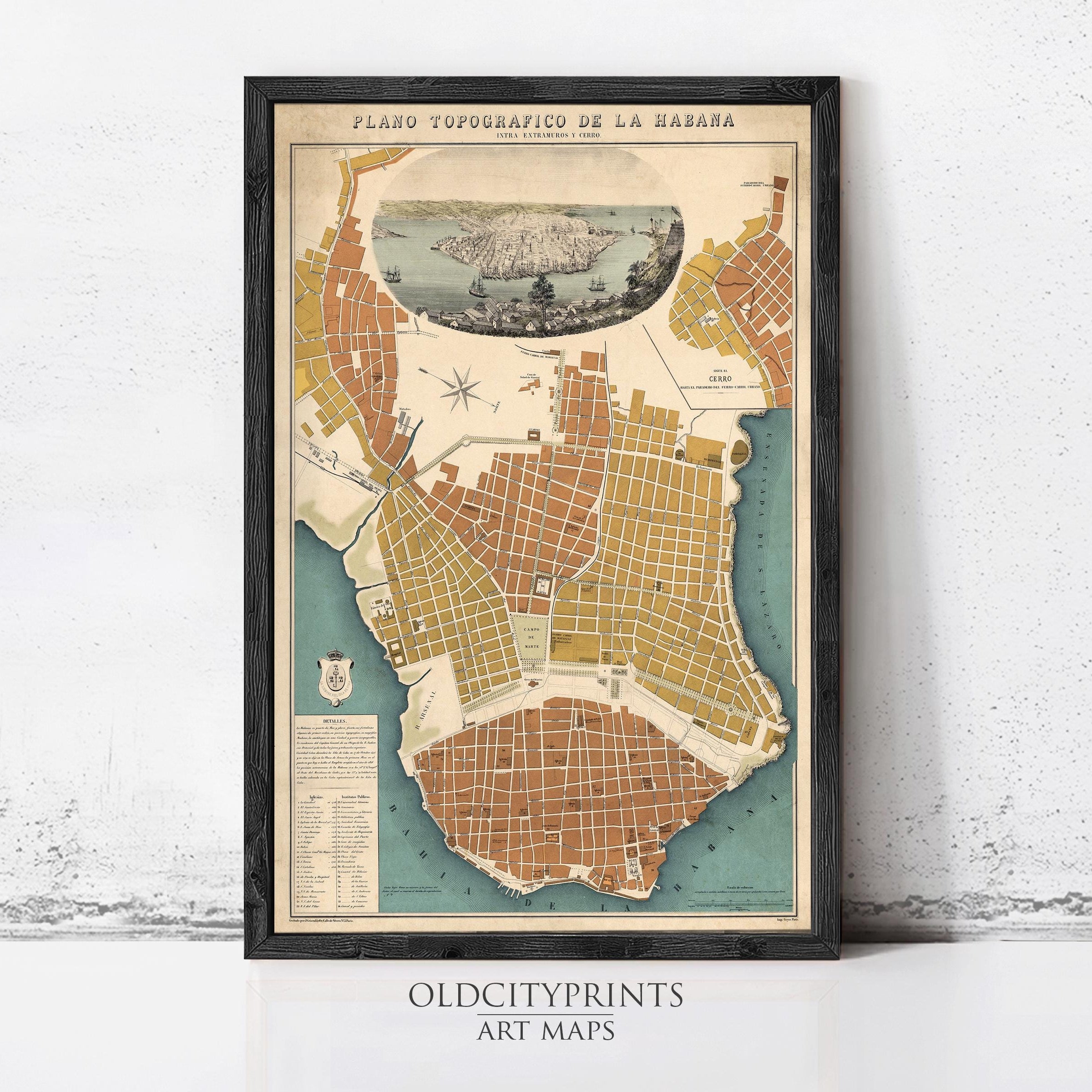 The image is a framed vintage map of a city, likely Havana, Cuba, with a detailed illustration of the city's layout and surrounding areas.