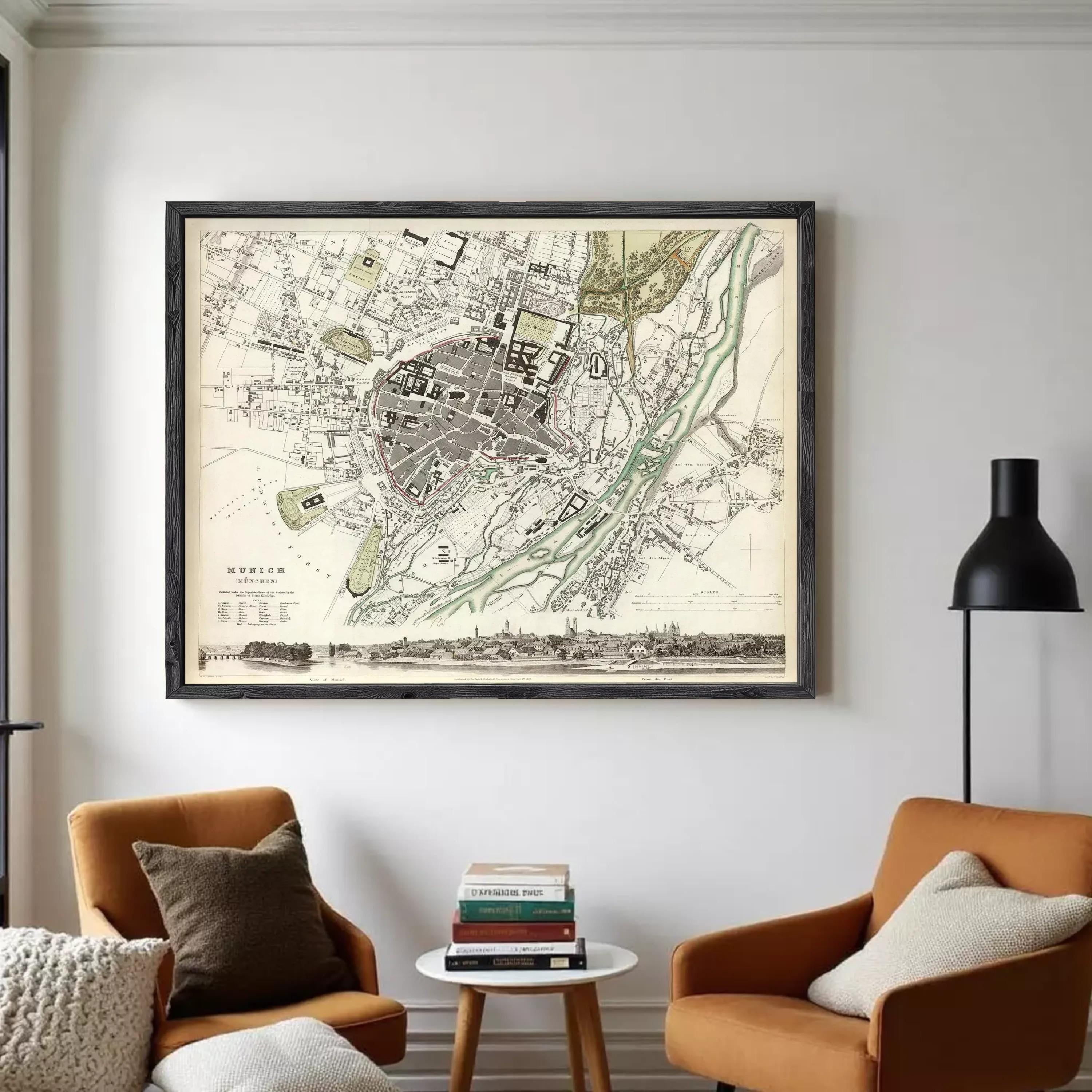 The image is a framed vintage map of a city, depicting a detailed layout of streets, buildings, and other urban features.