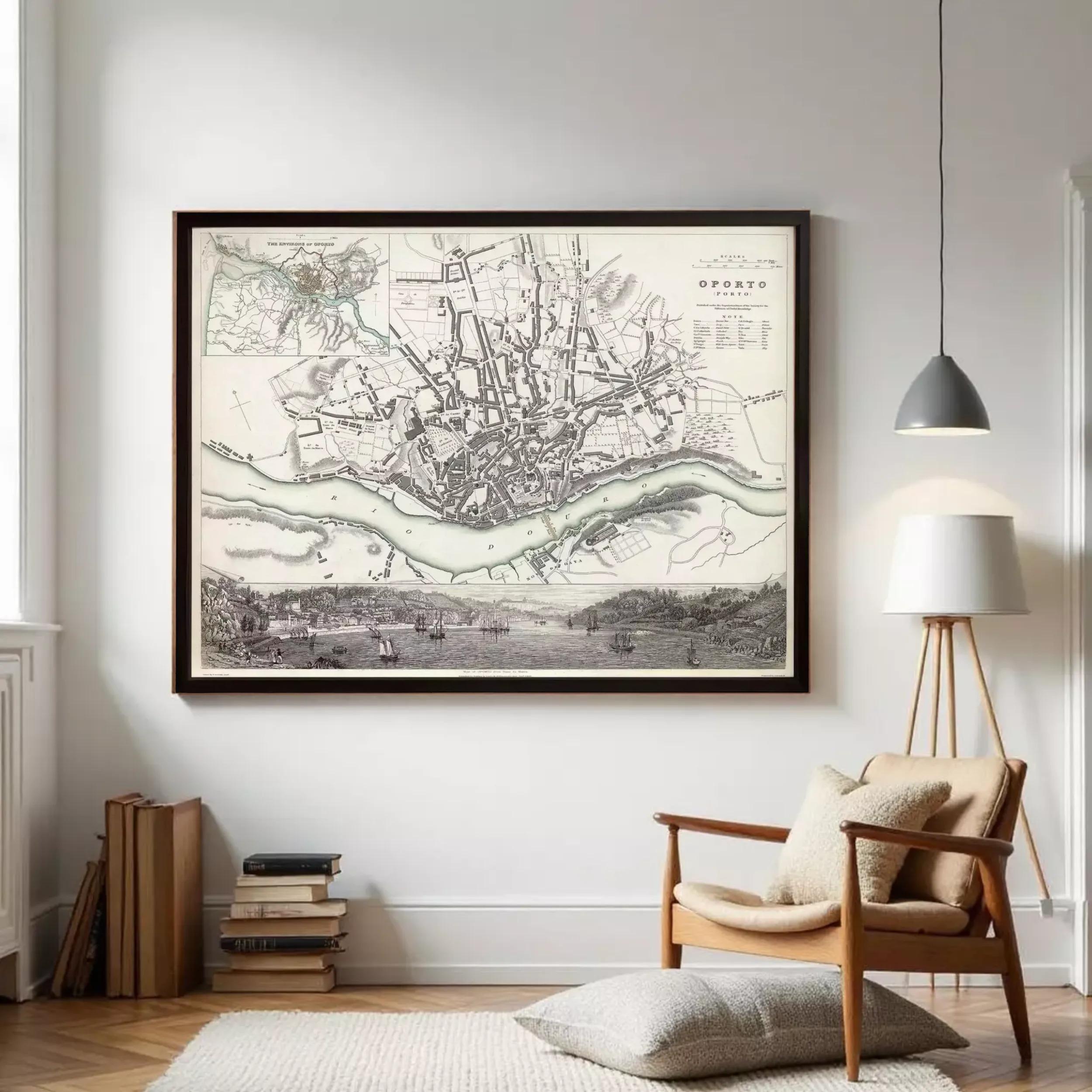 The image is a framed historical map of a city, depicting a detailed layout of the streets, rivers, and surrounding landscape.