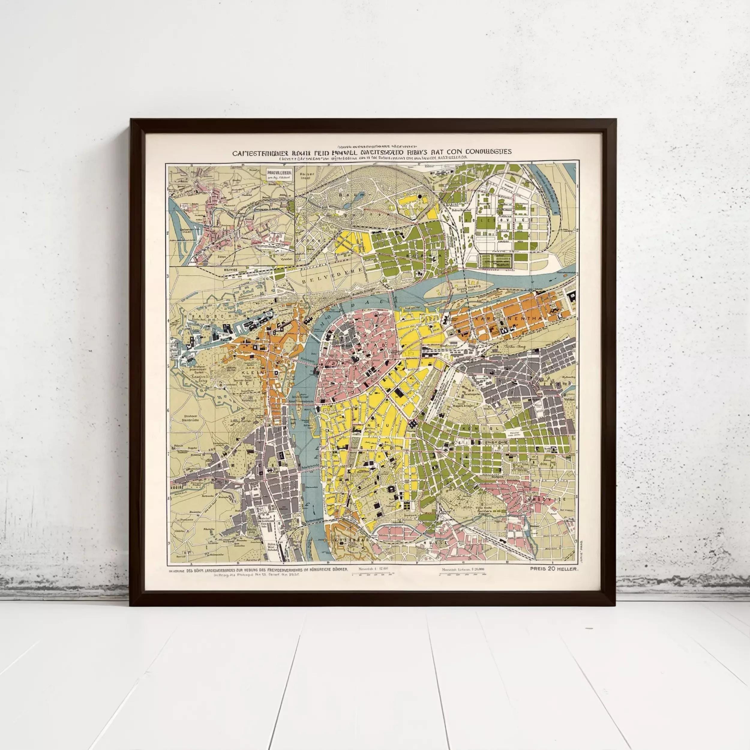 The image is a framed vintage map of a city, depicting various landmarks and streets in different colors.