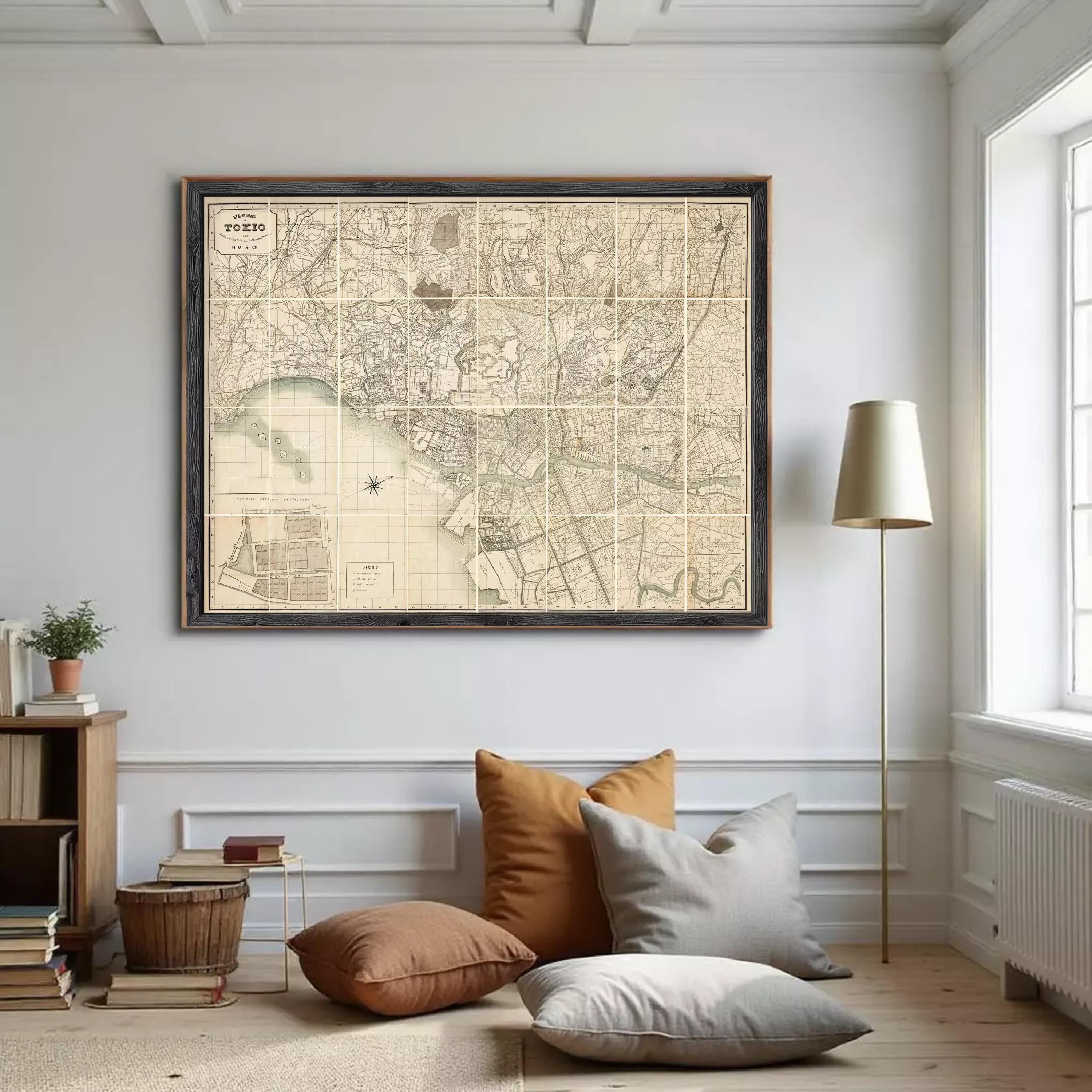 The image is a framed vintage map ofTOKYO, Japan, depicting a detailed layout of the city.
