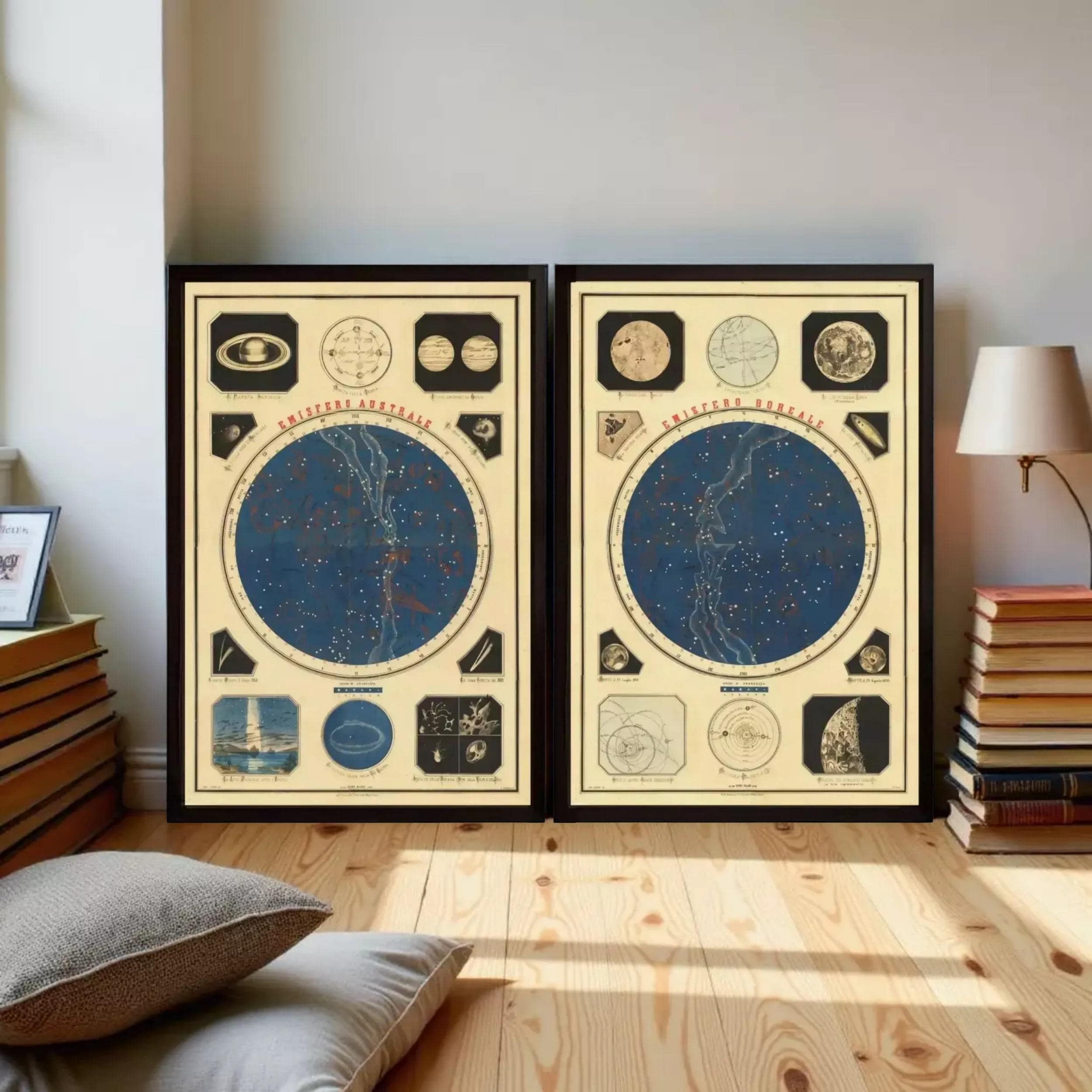 two framed star maps or star charts, each depicting a different celestial object or constellation, placed on a wooden floor in a room with books and a lamp.