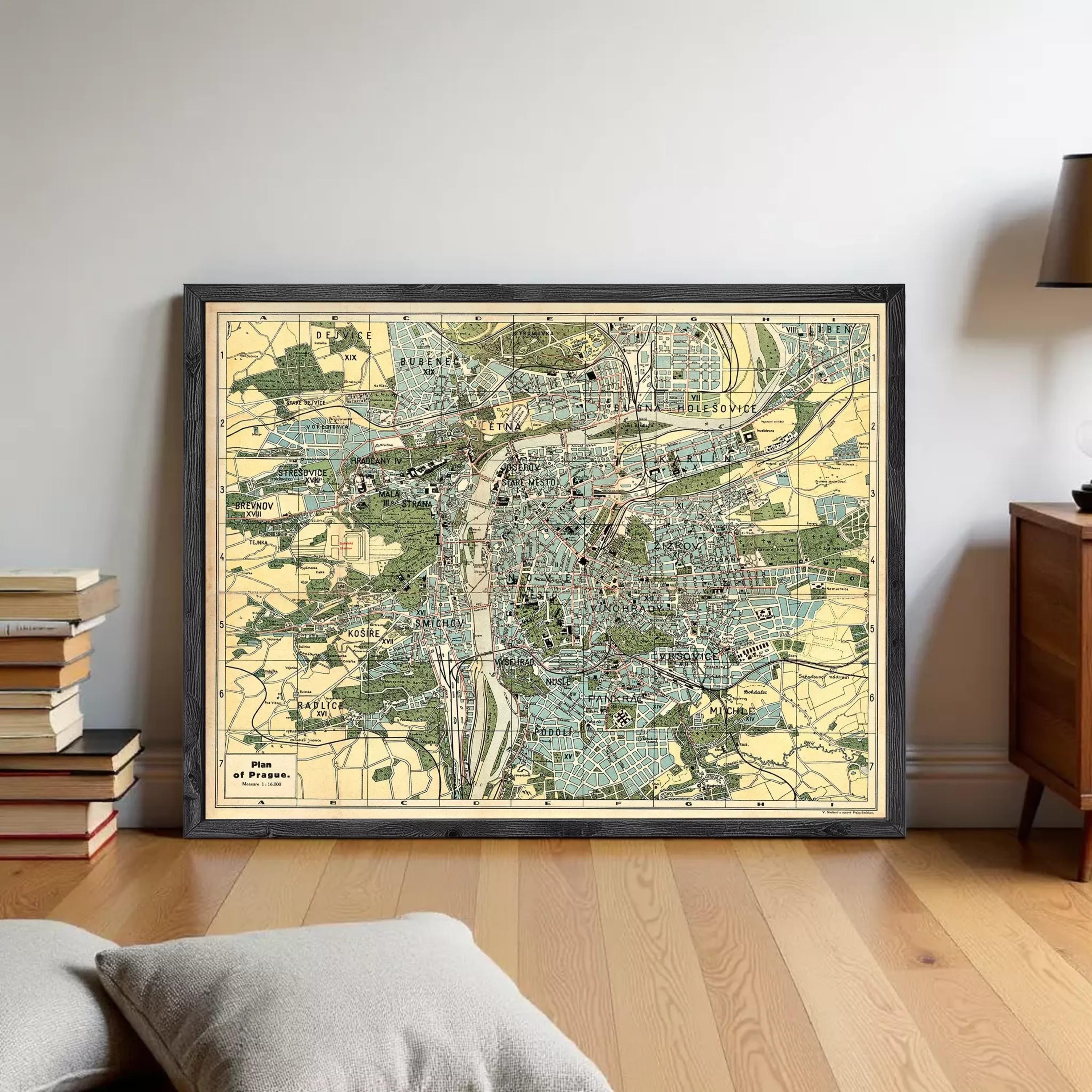 The image is a framed vintage map of a city, likely Paris, with various streets, landmarks, and geographical features depicted.