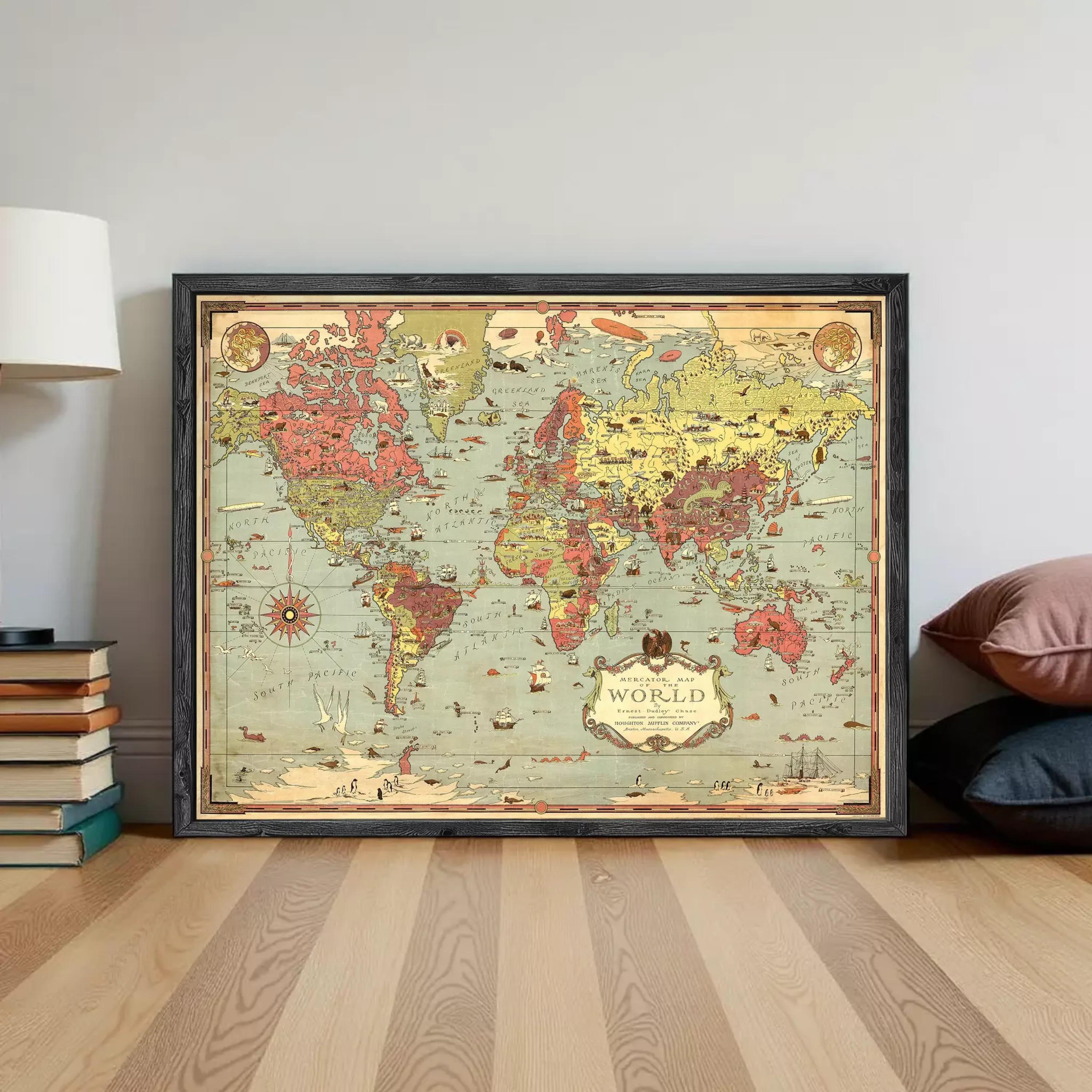 The image is a framed vintage world map with a black border and a decorative border around the edges.