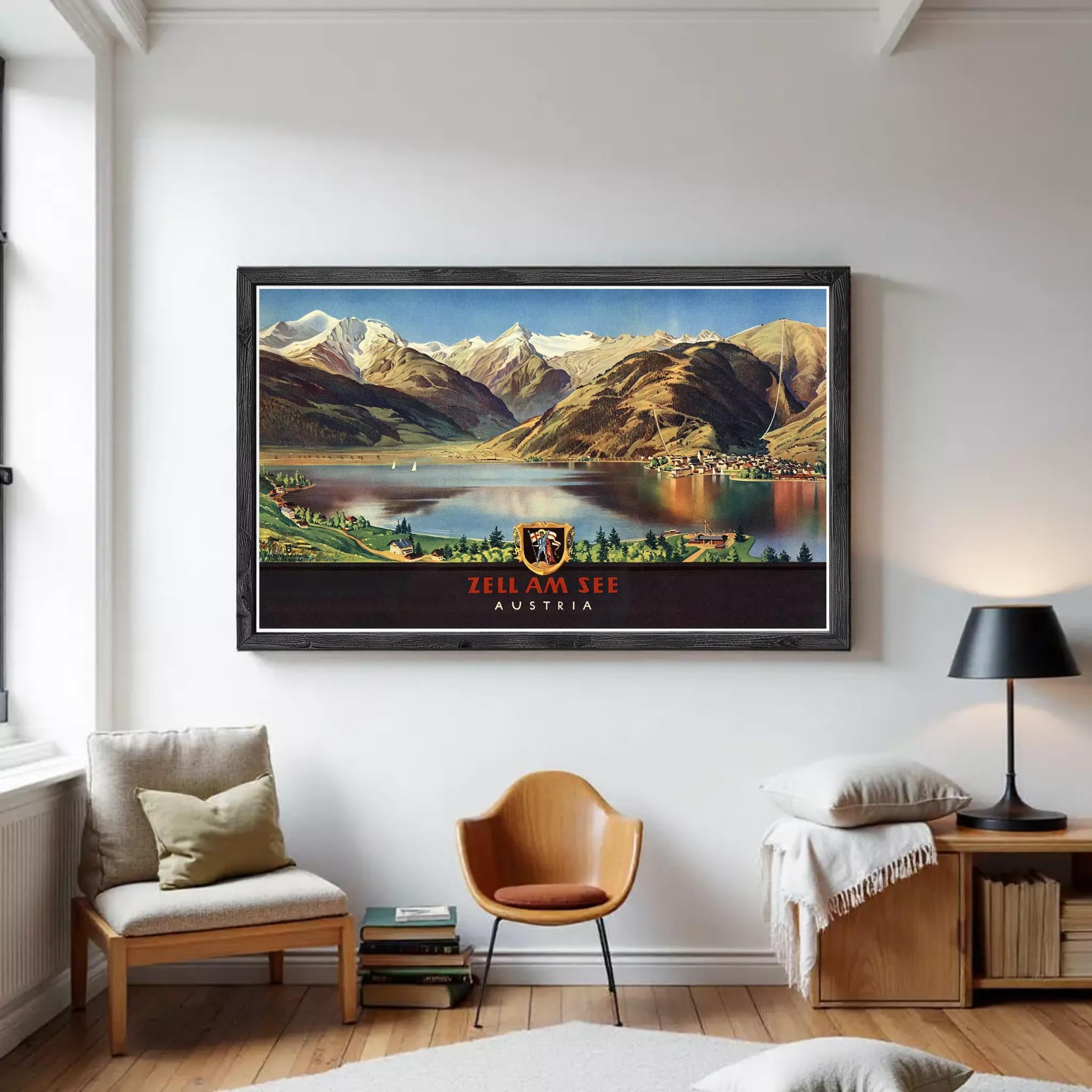 A framed vintage poster depicting a scenic mountain landscape with a lake and a town in the foreground, with the text "ZELL AM SEE AUSTRIA" prominently displayed.