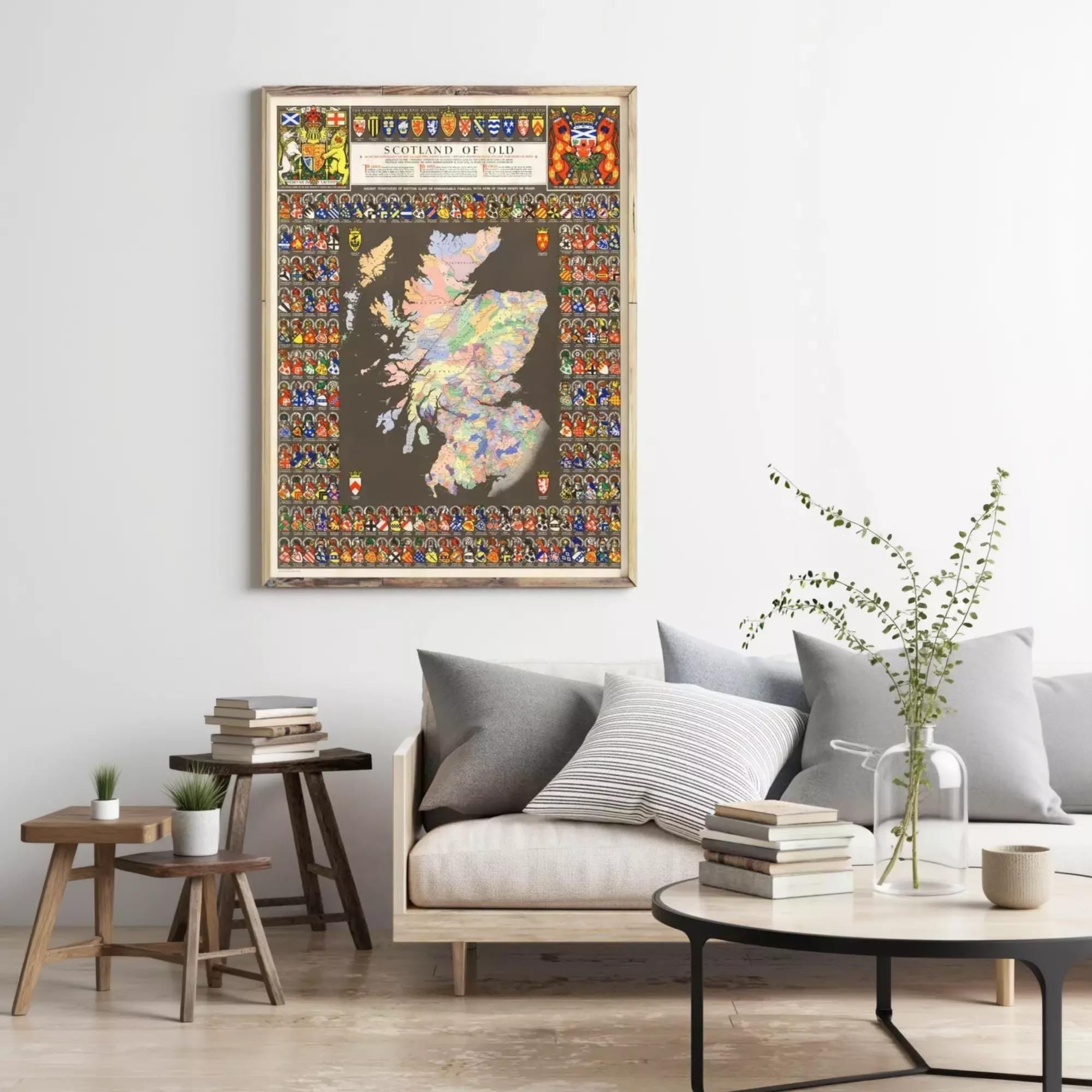 a large, colorful map of Scotland hanging on a wall in a living room.