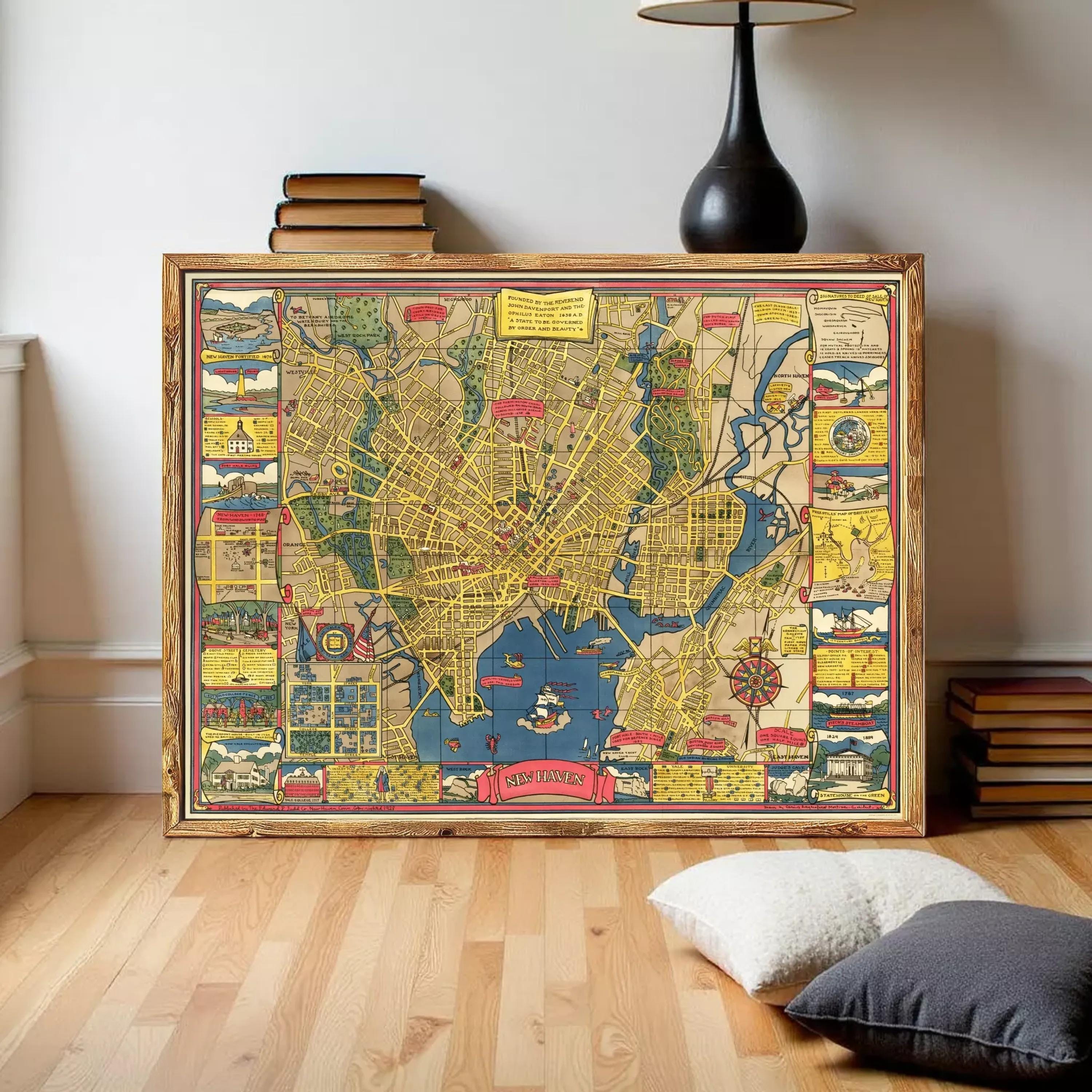 a large framed map of a city, with various landmarks and streets depicted in a colorful and detailed manner.