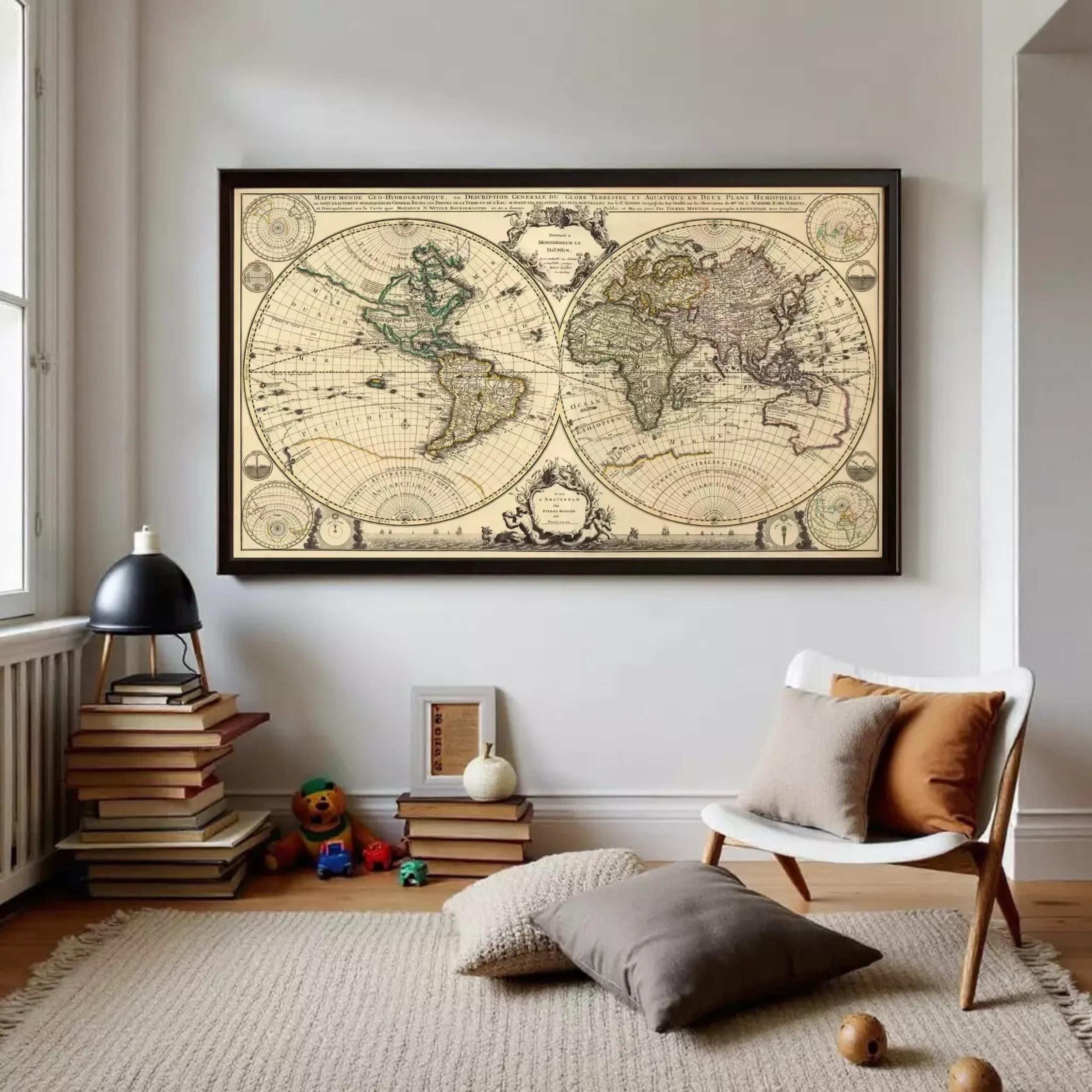a large, antique world map hanging on a wall in a room with a chair, books, and toys.