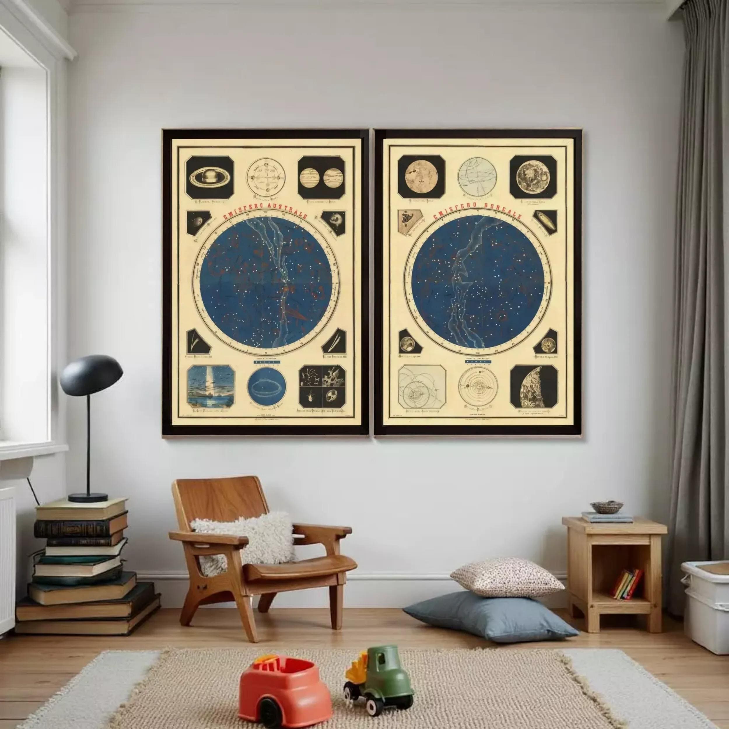 a cozy living room with two framed star maps hanging on the wall, a wooden chair, a small table with a lamp, and a stack of books.