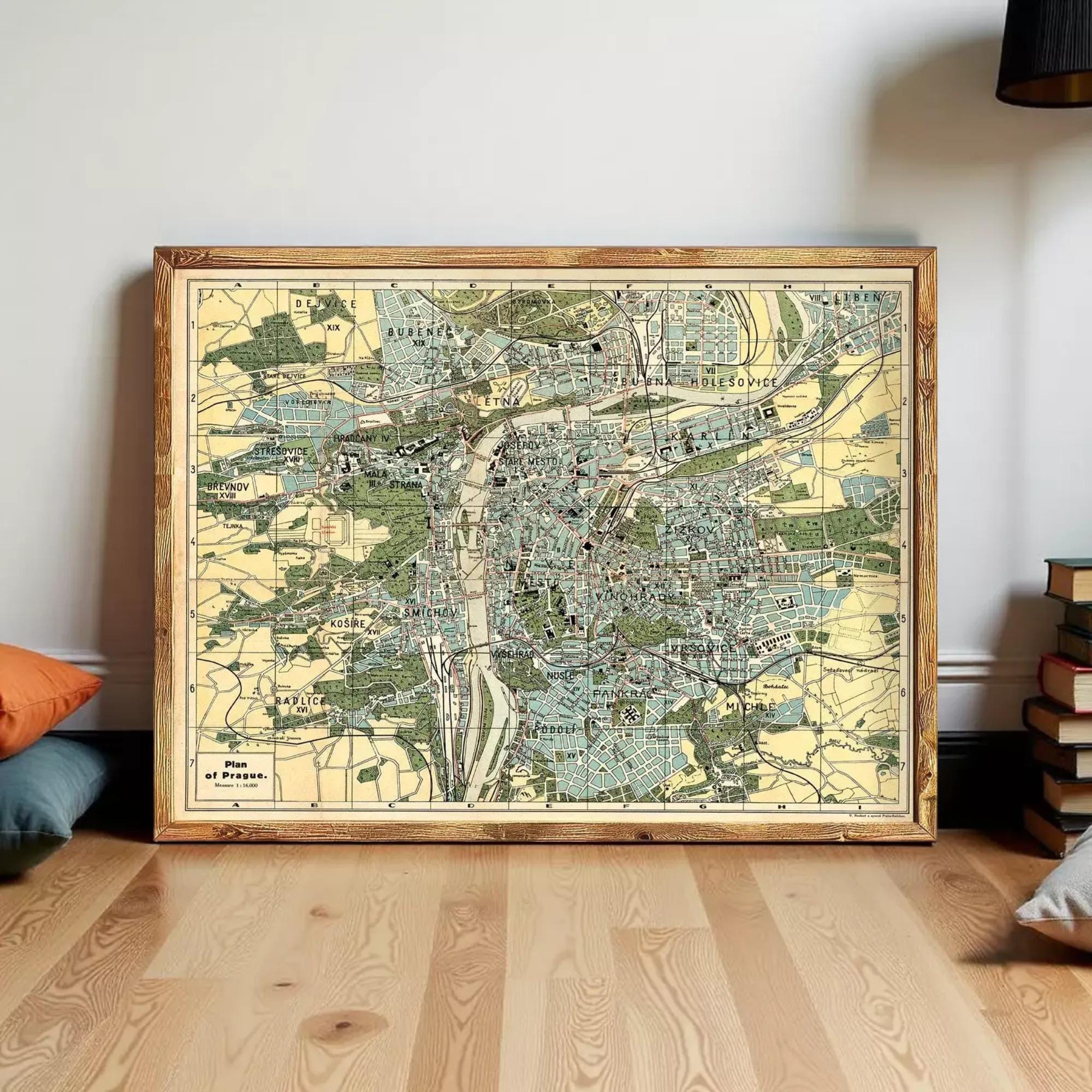 a large framed map of a city, with various streets and landmarks depicted on it.