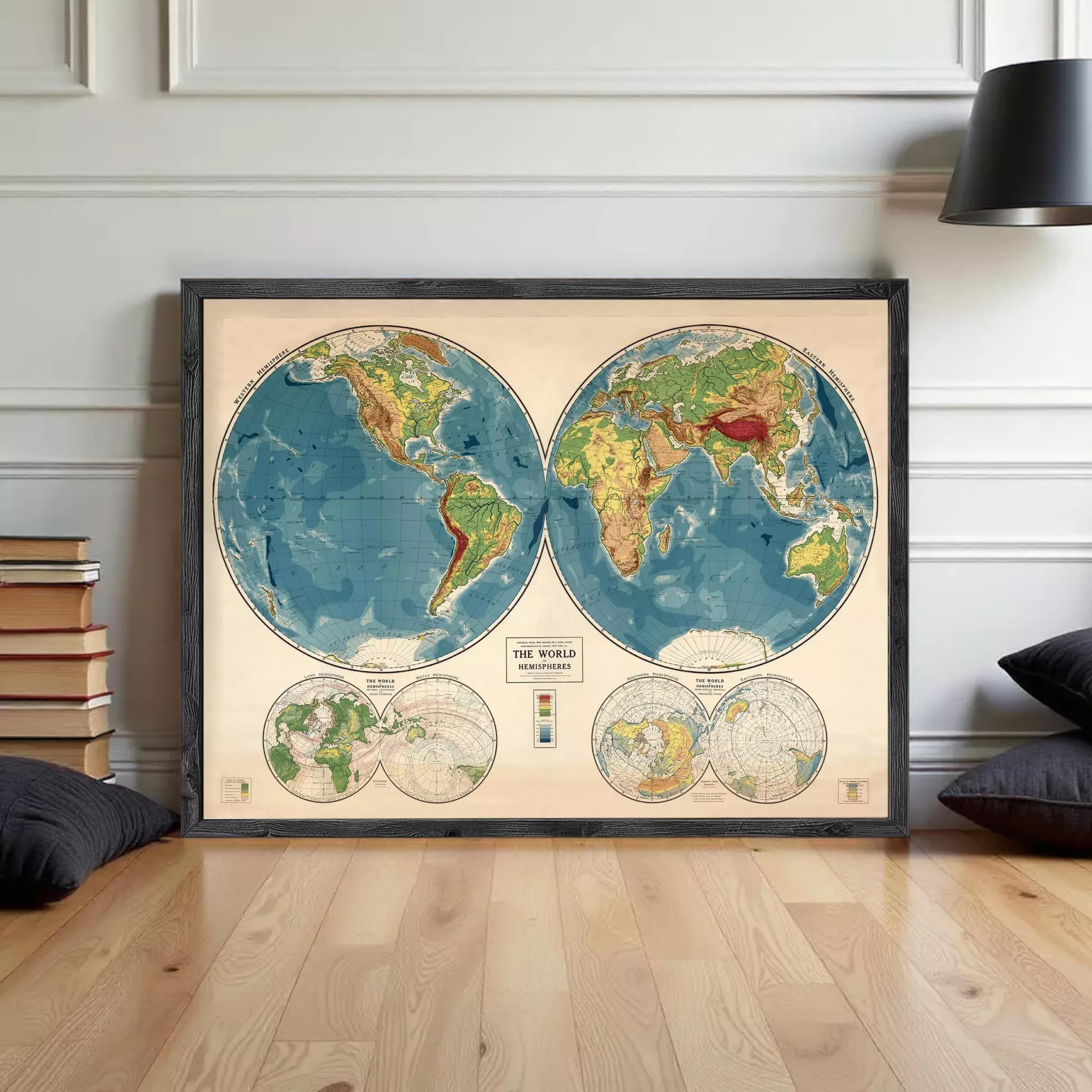 The image is a framed vintage map of the world, depicting the continents and oceans in a detailed and colorful manner.
